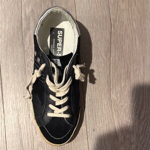 Golden Goose Black and White Sneakers